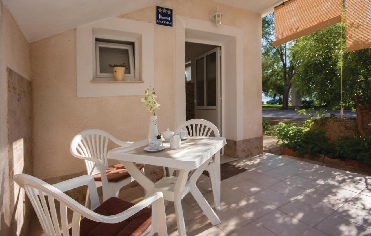 Nice Apartment In Raslina With House Sea View Bagian luar foto