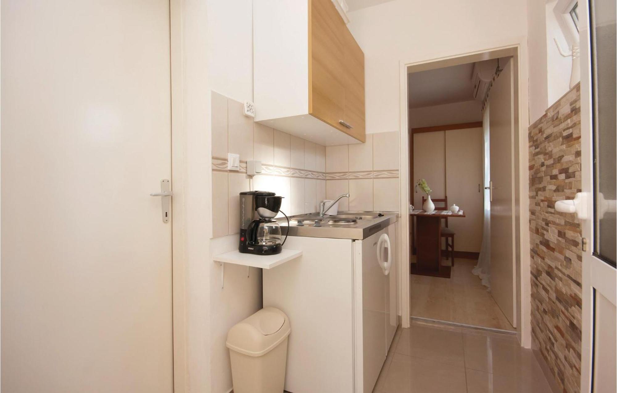 Nice Apartment In Raslina With House Sea View Bagian luar foto