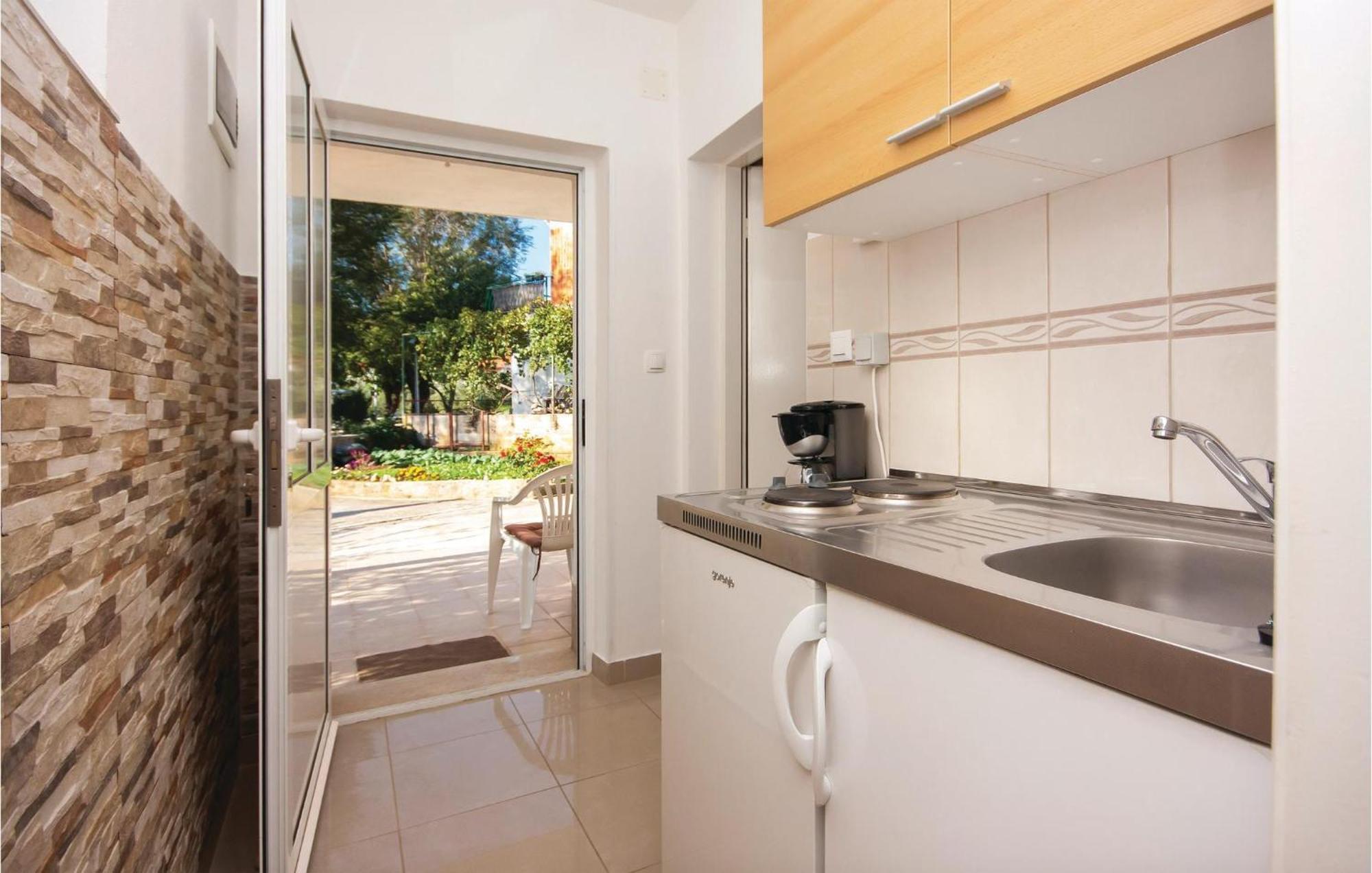 Nice Apartment In Raslina With House Sea View Bagian luar foto